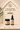 Shiba Organics The Barrier Recovery Duo skincare bundle featuring a jar labeled 'The Healer' and a dropper bottle labeled 'Nourishing Roots' under an arched decorative frame with leaf shadows.
